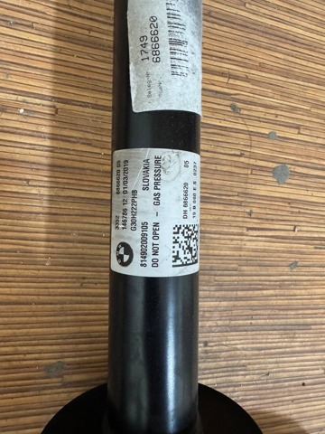 Стійка амортизатора задня 33526866620 BMW