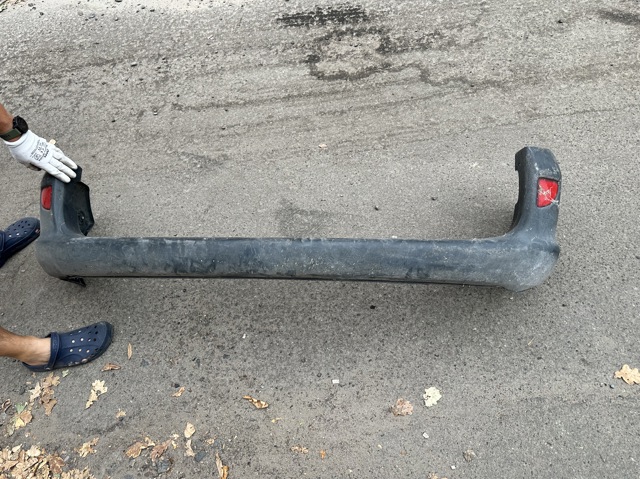 Бампер задній 7700304880 RENAULT