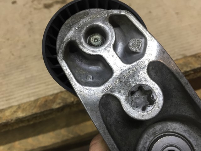 Натягувач приводного ременя 11287599097 BMW