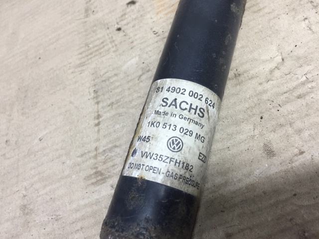 Стійка амортизатора задня 1K0513029MG VAG