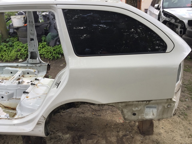 Боковина кузова ліва 1Z9809029 VAG