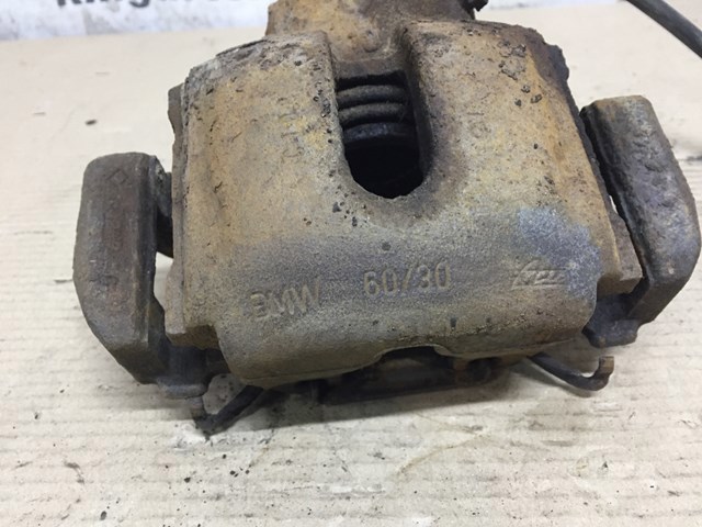 Супорт гальмівний, передній, правий 34116773132 BMW