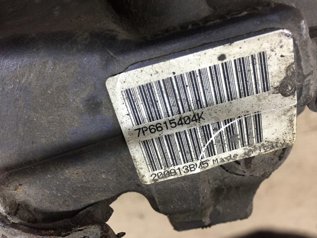 Супорт гальмівний задній правий 7P6615404K VAG