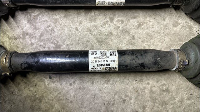 Привід передній правий 31608486202 BMW