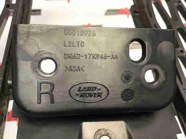 Заглушка ПТФ бампера переднього права DK6217K946AA LAND ROVER