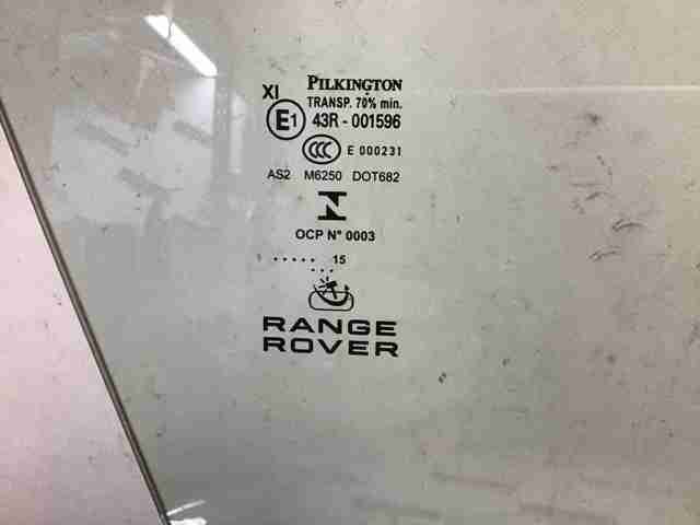 Скло пасажирських дверей DK6221410CB LAND ROVER