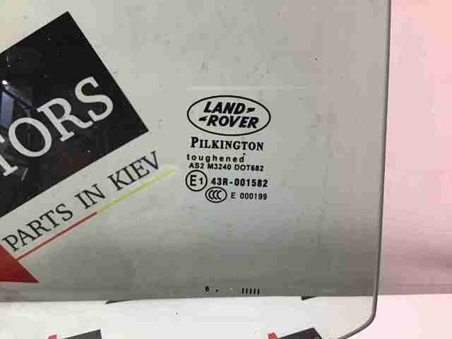 Скло задніх дверей, правих LR001741 LAND ROVER