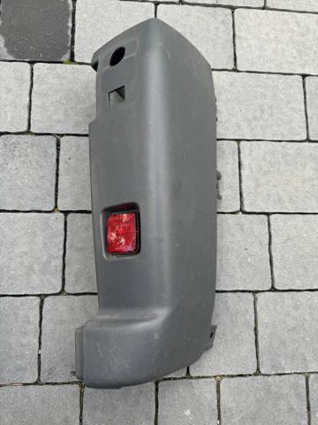 Ікло заднього бампера праве 1305761070 PEUGEOT