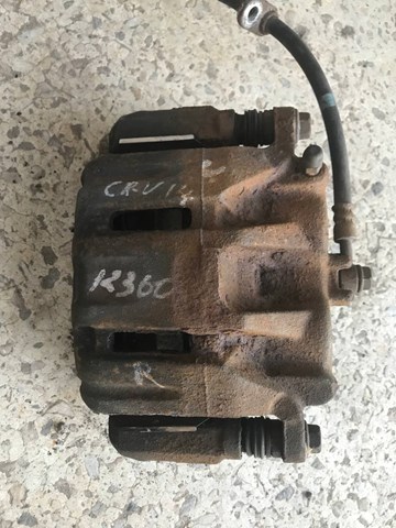 Супорт гальмівний, передній, правий 45018SHJA01 HONDA