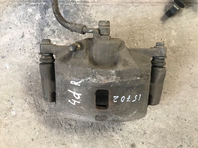 Супорт гальмівний, передній, правий 45018SNC000 HONDA