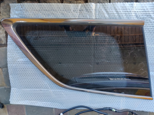 Скло багажного відсіку, ліве 68259511AC CHRYSLER