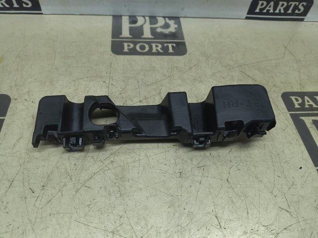 Кронштейн бампера переднього, зовнішній правий 86514J9000 HYUNDAI