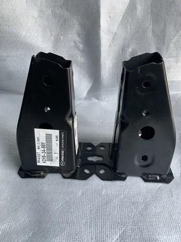 Кронштейн передньої балки KDY03488Y MAZDA
