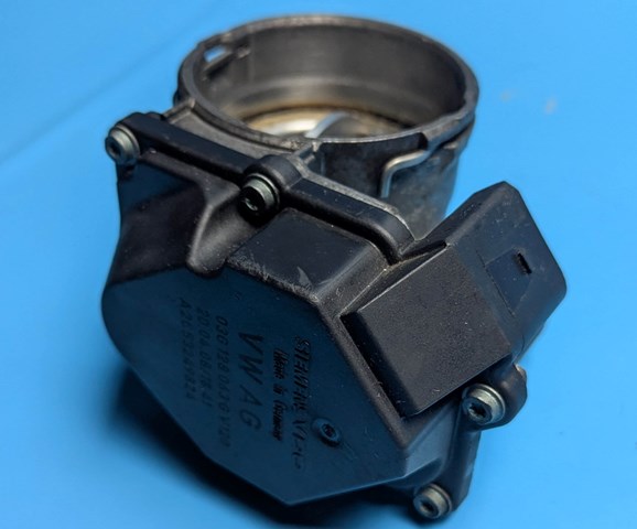 Блок дросельної заслінки 03G128063G VAG