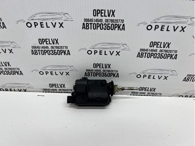 Мотор-привід відкриття лючка бака 13158426 GM
