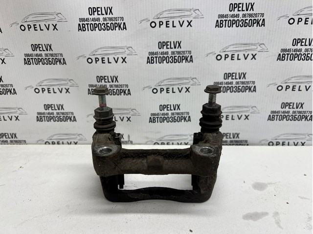 Скоба супорту заднього 93181277 GM