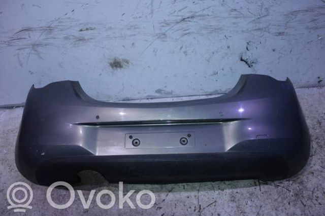 Бампер задній 39002839 OPEL