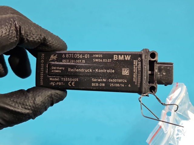 Блок системи контролю тиску в шинах 6871056 BMW