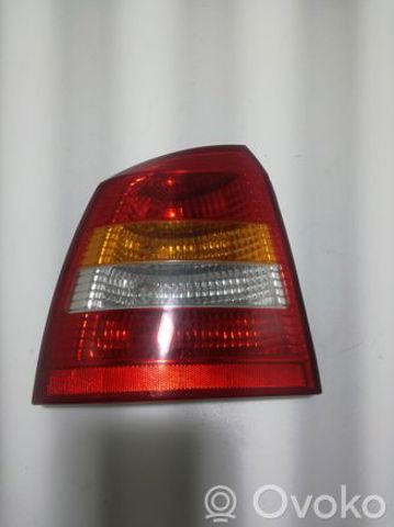 Ліхтар задній лівий 90521542 OPEL