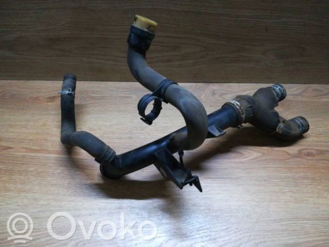 Трубопроводи і шланги системи охолодження 90531675 OPEL