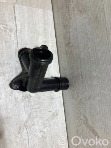 Водяний патрубок 9671124980 FORD