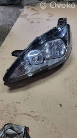 Фара основна ліва 9677523080 PEUGEOT