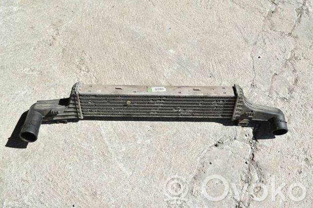 Охолоджувач наддувочного повітря A2105000400 MERCEDES