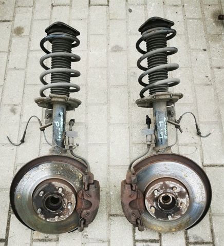 Стійка передня права AV6118045ABE FORD