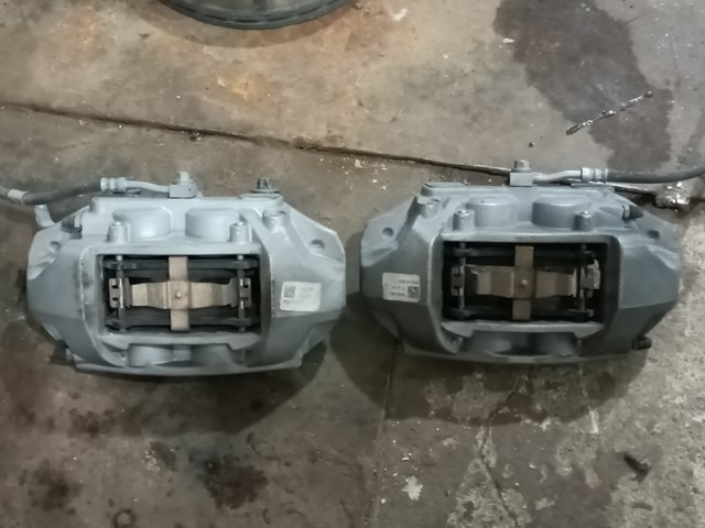 Супорт гальмівний, передній, правий 104462200E TESLA