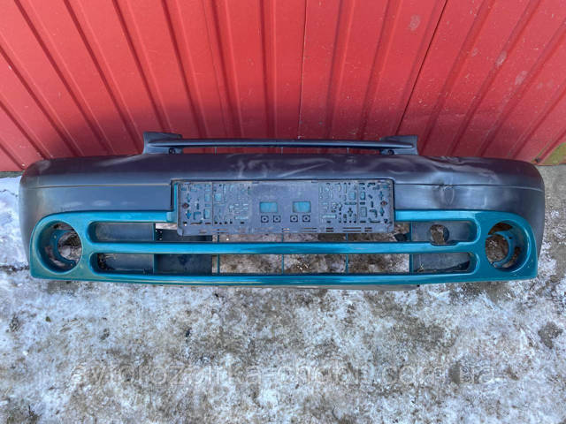 Кожух бампера переднього 7700307057 RENAULT