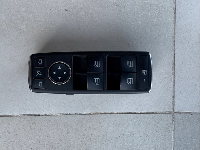 Кнопки переднього лівого склопід'ємника 2129056100 MERCEDES