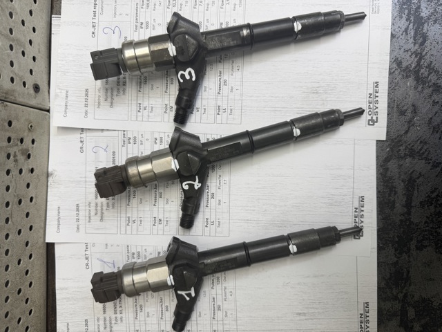 Форсунки електромагнітні 166008H800 DENSO