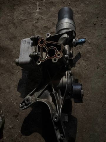 Кронштейн генератора 06K903143 VAG
