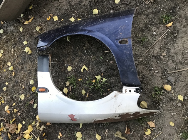 Переднє ліве крило 1101010 OPEL