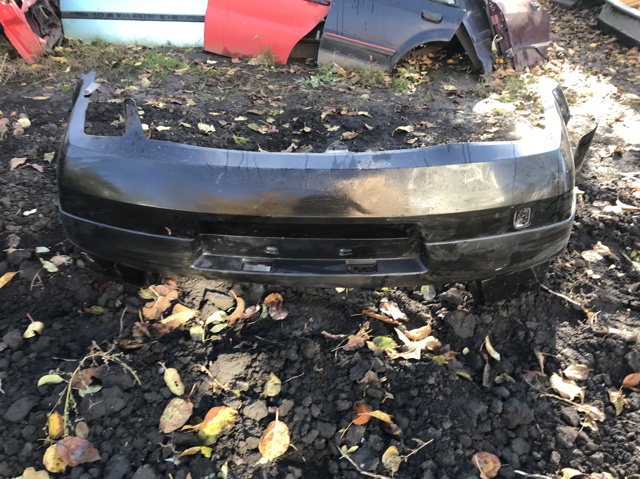 Буфер (бампер) задній 8200238323 RENAULT