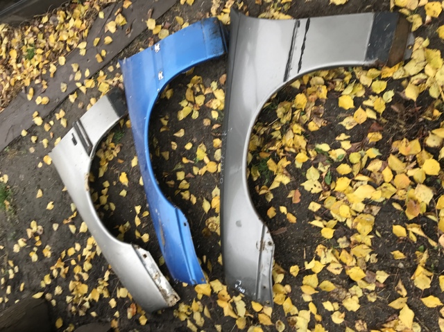 Переднє ліве крило 90376210 OPEL