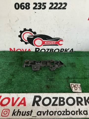 Ліве кріплення переднього бампера 13356870 OPEL