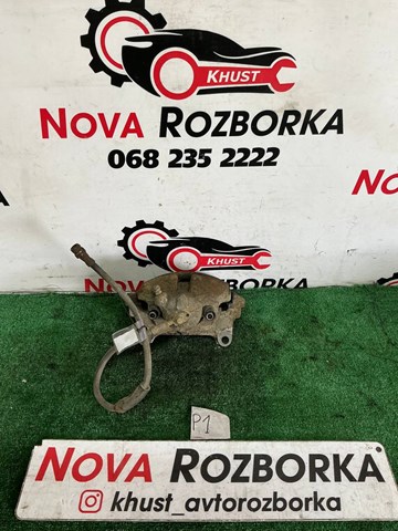 Супорт гальмівний, передній, лівий 1K0615123E VAG
