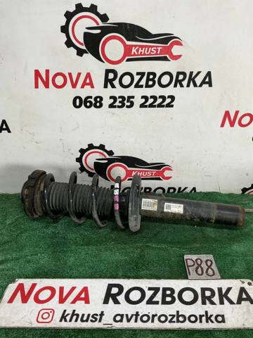 Стійка передня 1T0413031HM VAG