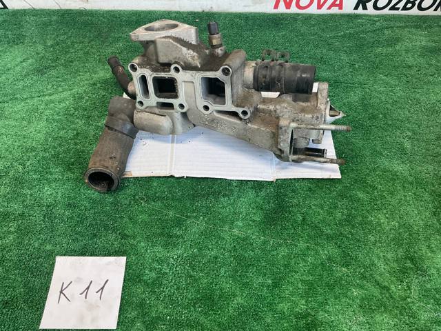 Корпус термостата в зборі 256102F300 HYUNDAI