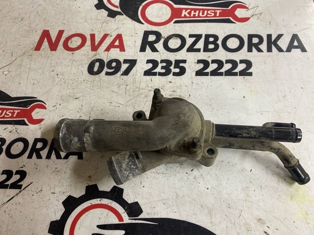 Корпус термостата в зборі KIA Cerato 1