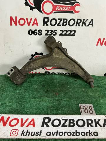 Правий важіль передній нижній підвіски 352872 OPEL
