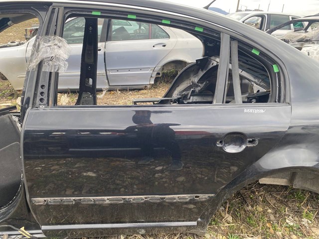 Двері задні, ліві Skoda SuperB 1
