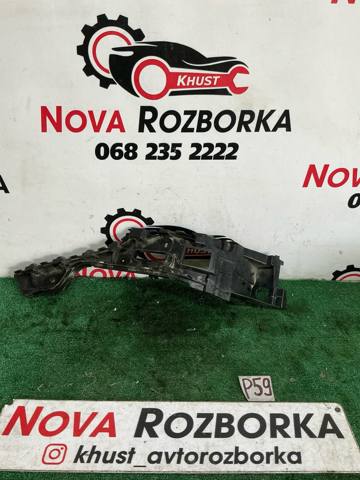 Лівий кронштейн заднього бампера 7P6807393 VAG