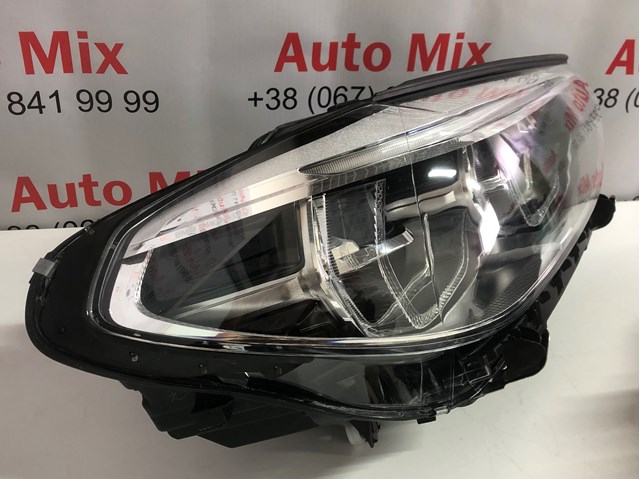 Фара передня права 7466120 BMW