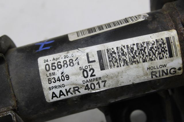 Амортизатор передньої підвіски, лівий 13474017 GM