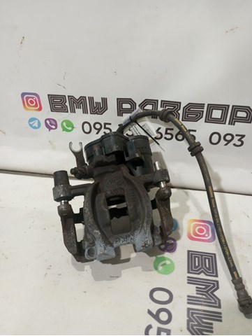Задній гальмівний супорт лівий 34206883033 BMW