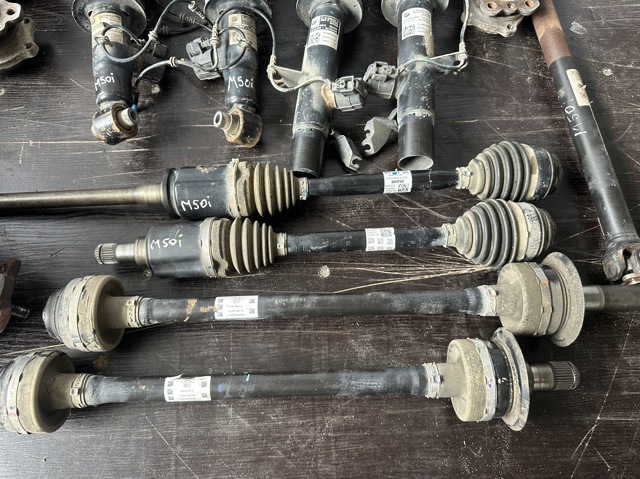 Привід передній правий 31608486206 BMW