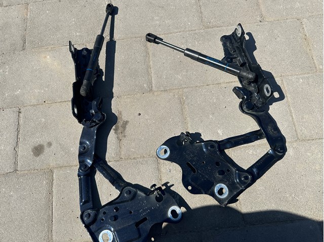 Завіса капота ліва 41009477741 BMW