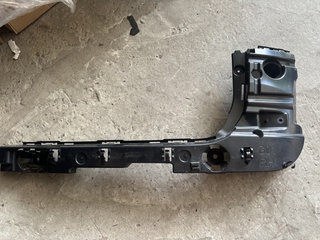 Кронштейн бампера заднього, правий 51127400666 BMW